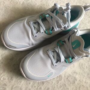 New. Teal, white and gray Nike React Miler Women’s 8.5 Never worn.